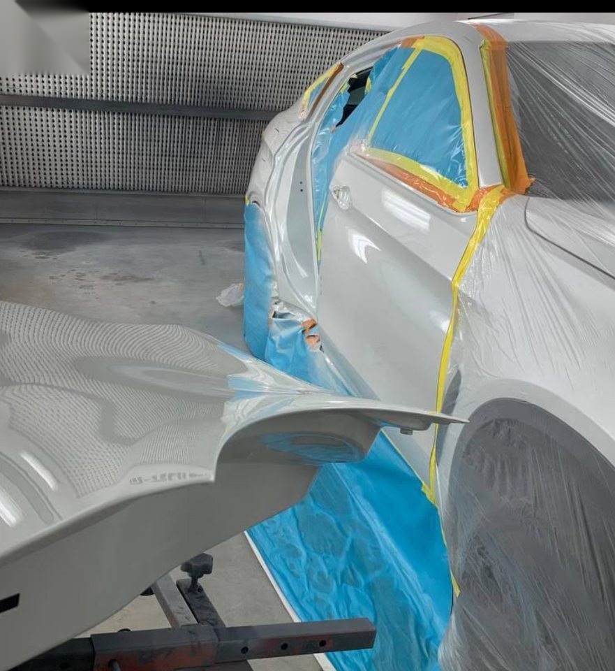 Vehicle masked for paint refinishing